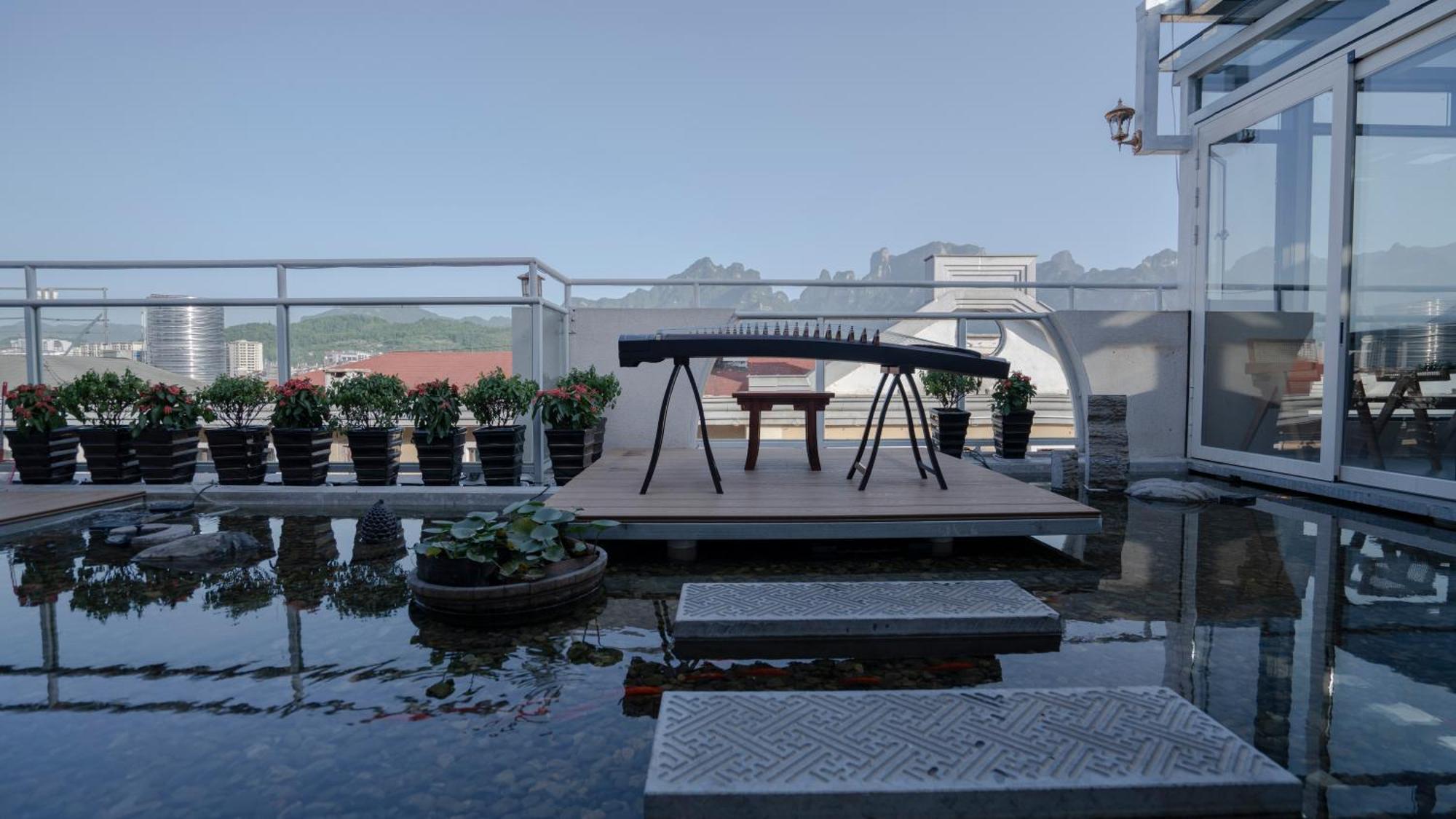 Patio Spring Holiday Inn -- Free Round Trip Pick-Up Service --Panoramic View Of Tianmen Mount Zhangjiajie Buitenkant foto