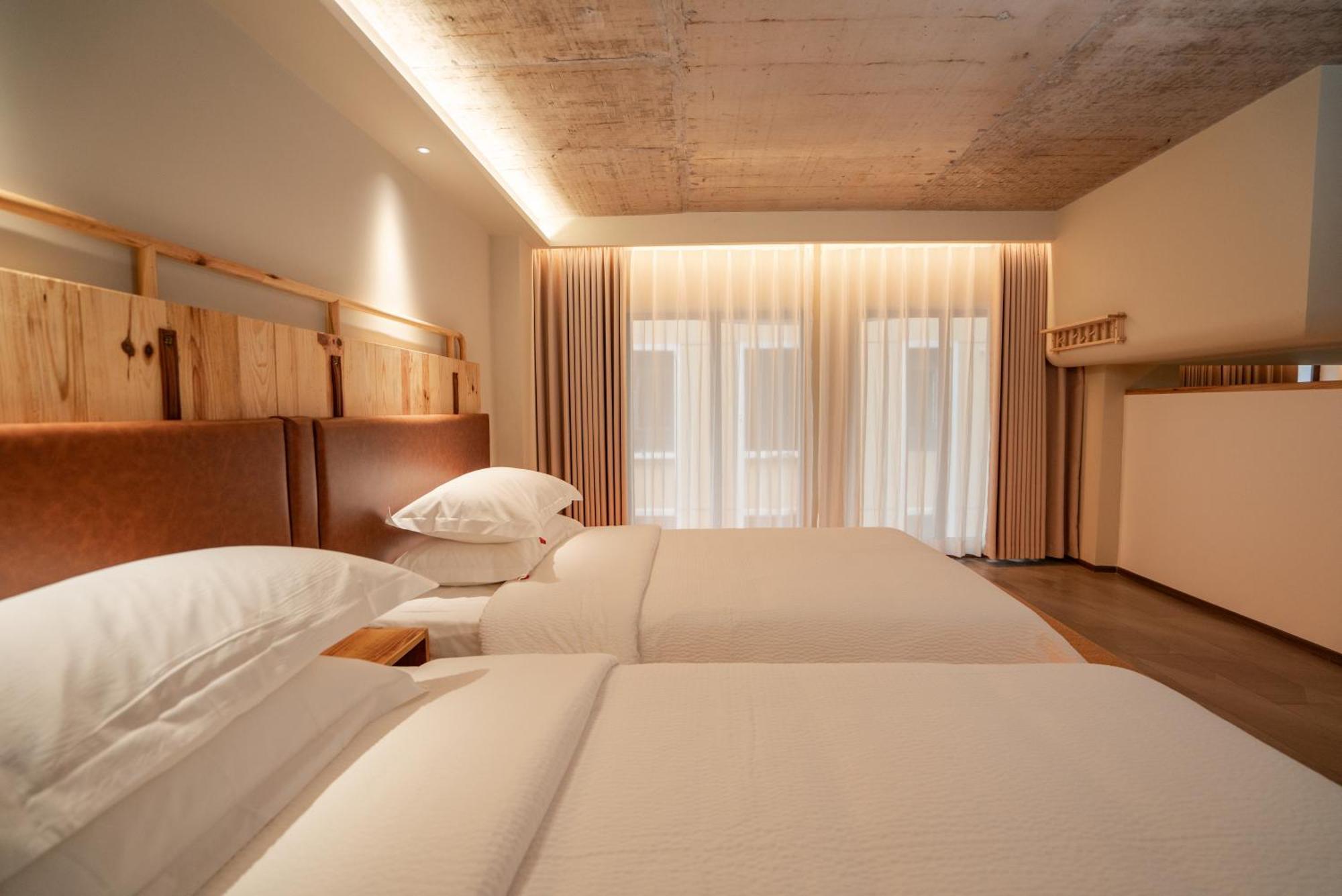 Patio Spring Holiday Inn -- Free Round Trip Pick-Up Service --Panoramic View Of Tianmen Mount Zhangjiajie Buitenkant foto