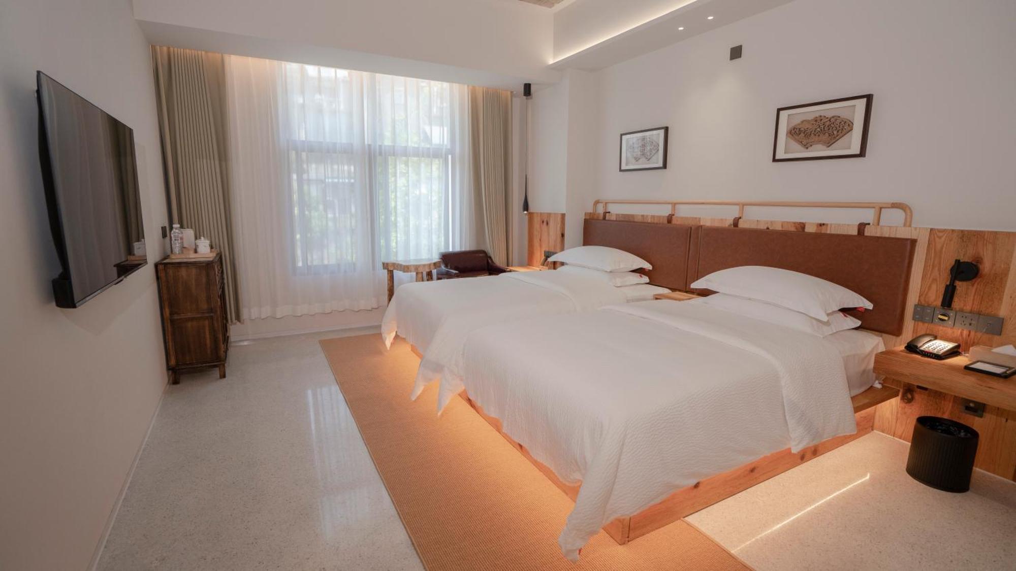 Patio Spring Holiday Inn -- Free Round Trip Pick-Up Service --Panoramic View Of Tianmen Mount Zhangjiajie Buitenkant foto