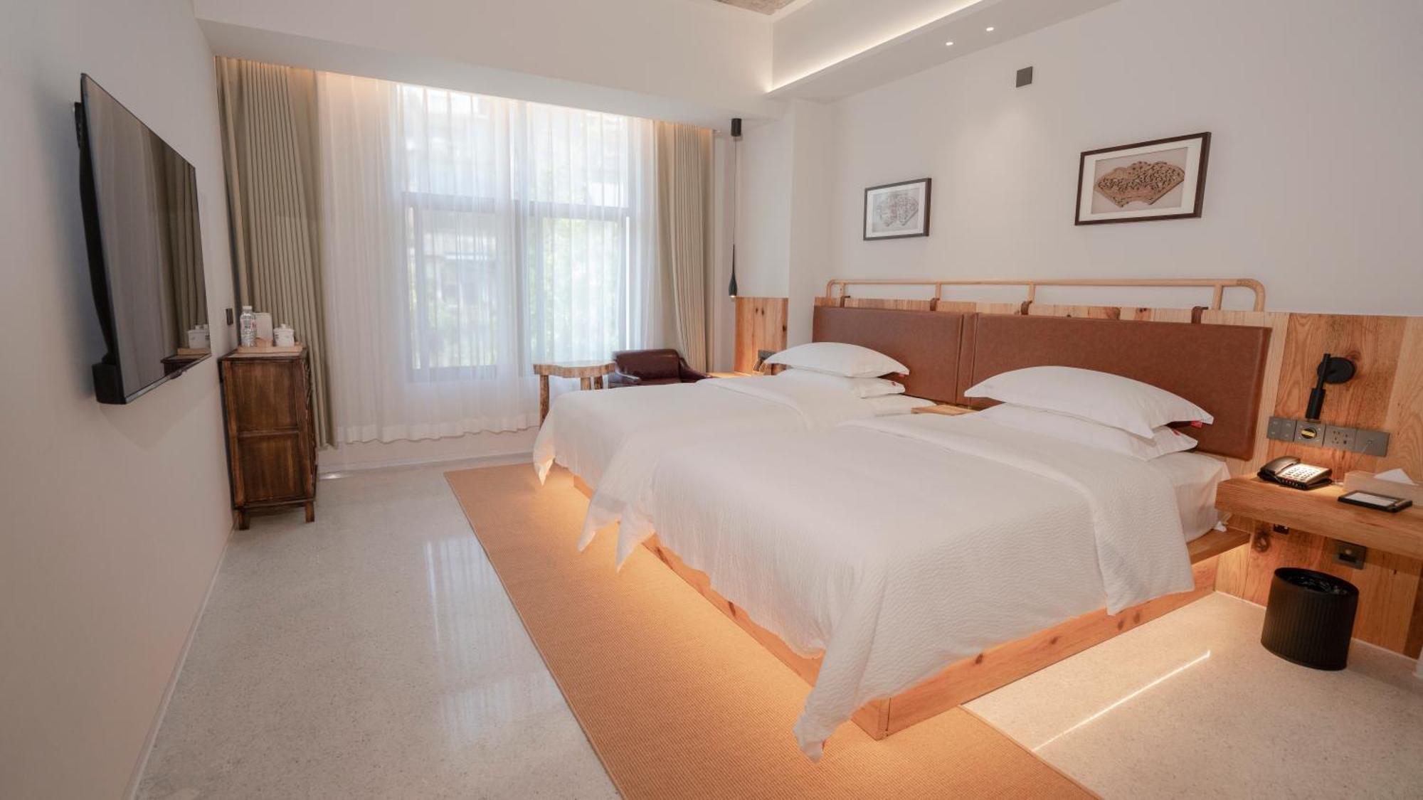 Patio Spring Holiday Inn -- Free Round Trip Pick-Up Service --Panoramic View Of Tianmen Mount Zhangjiajie Buitenkant foto