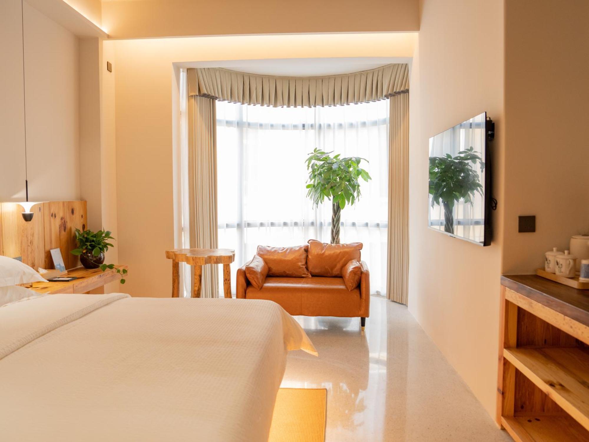 Patio Spring Holiday Inn -- Free Round Trip Pick-Up Service --Panoramic View Of Tianmen Mount Zhangjiajie Buitenkant foto